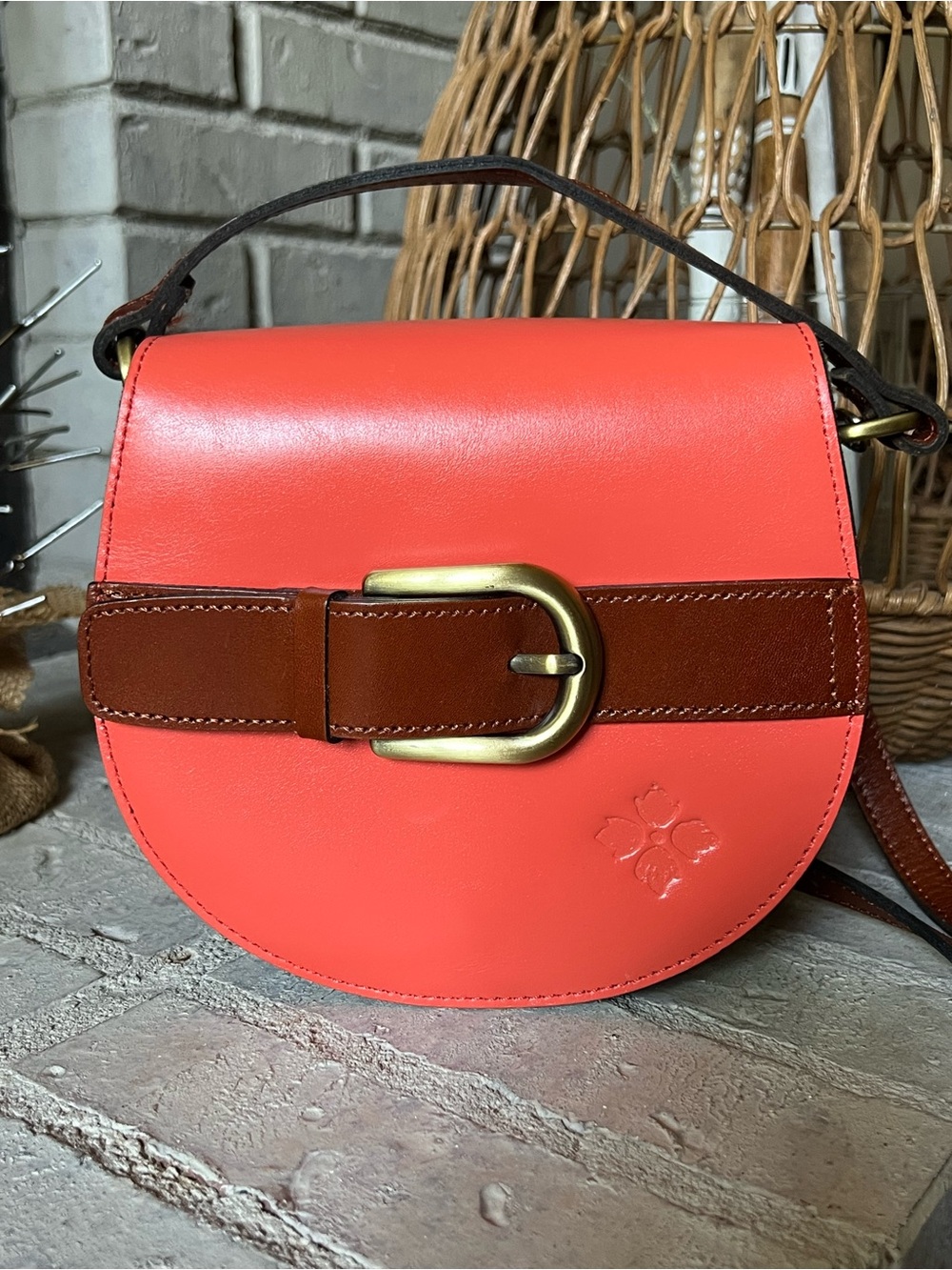 Coral Leather Crossbody Bag with Brown Belt Accent